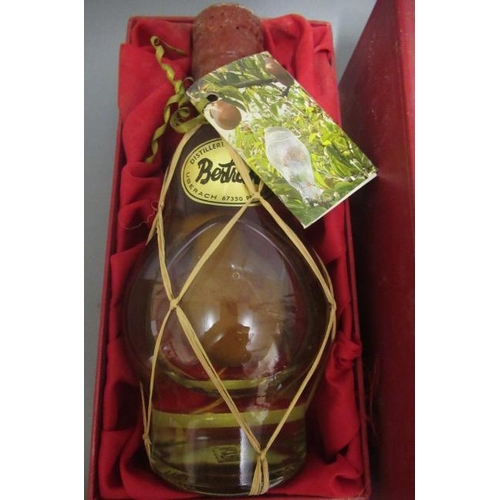 71 - 2 ceramic bottles of boxed rice wine (pagoda brand and other), together with a boxed Bertrand pear l... 