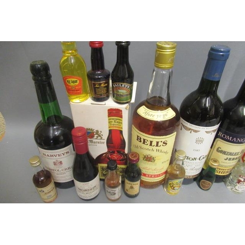 9 - 2 boxes of mixed alcohol, including 1 boxed Grand Marnier, 1 1985 Mouton Cadet, 1 vintage Bell's Ext... 