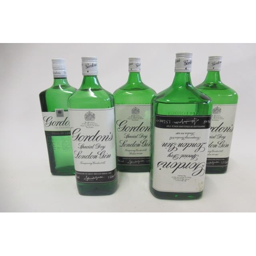 90 - 5 bottles of Gordons gin, comprising 3 1.5litre bottles and 2 1litre bottles