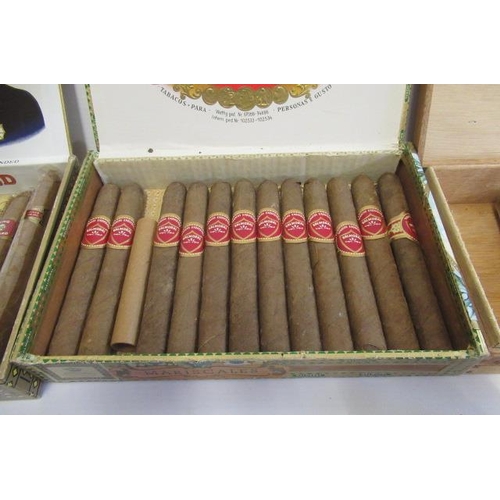 91 - A collection of cigars, comprising a box of 12 Balmoral cigars in original box,10 Churchill Smart ci... 