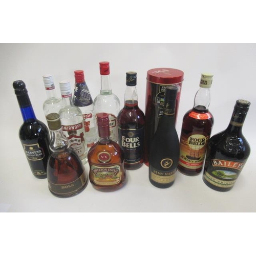 90A. - 11 bottles of mixed spirits & liqueurs, comprising 3 bottles Smirnoff vodka, 1litre Vladivar vodka, ... 