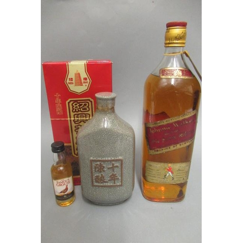 73 - 1 40fl. oz. bottle Johnnie Walker Red Label, together with a boxed Chinese wine and a Famous Grouse ... 