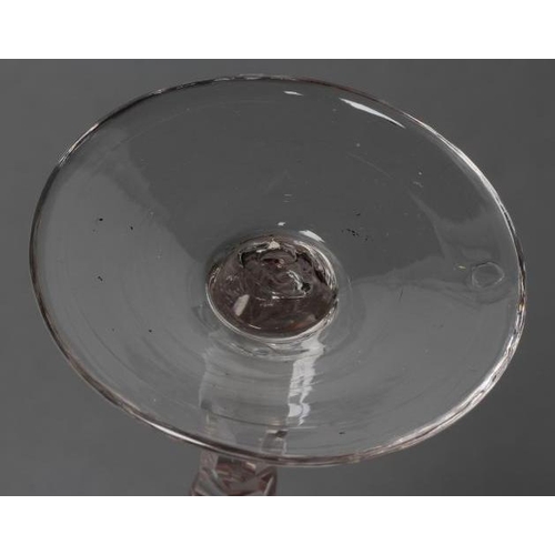 100 - A CORDIAL GLASS, late 18th century, the round funnel bowl wheel engraved with a continuous hunting s... 