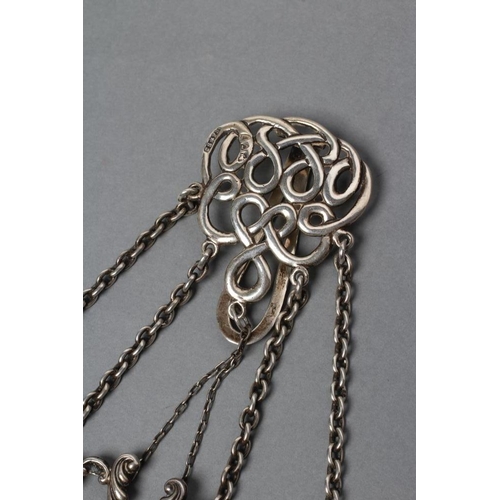 124 - A LATE VICTORIAN SILVER CHATELAINE, maker Saunders & Shepherd, London 1894, the open scroll belt cli... 