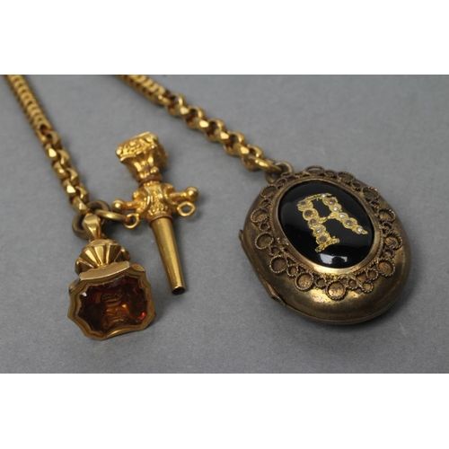 126 - A VICTORIAN GILT METAL CHATELAINE, the square convex panel engraved with scrolling foliage and centr... 