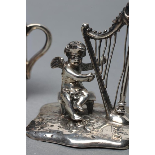 130 - A SMALL SILVER FIGURE, maker Bertholdt Muller, Chester import marks 1901, modelled as a cherub playi... 