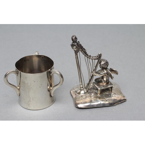 130 - A SMALL SILVER FIGURE, maker Bertholdt Muller, Chester import marks 1901, modelled as a cherub playi... 