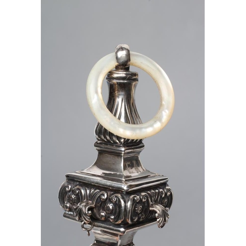 133 - AN EDWARDIAN SILVER RATTLE, maker Crisford & Norris, Birmingham 1907, of square baluster form stampe... 