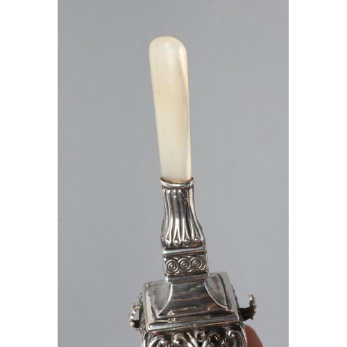 133 - AN EDWARDIAN SILVER RATTLE, maker Crisford & Norris, Birmingham 1907, of square baluster form stampe... 