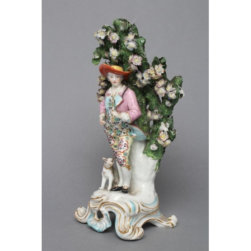 15 - A CHELSEA PORCELAIN FIGURE, c.1765, modelled as a young gentleman wearing a broad brimmed hat, pink ... 