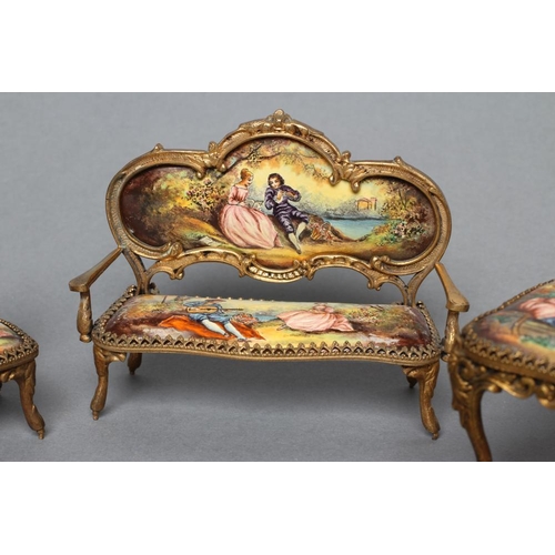 160 - AN AUSTRIAN GILT METAL AND ENAMEL MINIATURE BOUDOIR SET, painted in colours with figures in 18th cen... 