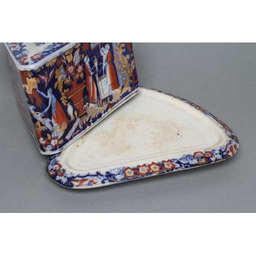 17 - A VICTORIAN STAFFORDSHIRE POTTERY CHEESE WEDGE AND STAND printed in underglaze blue and overpainted ... 