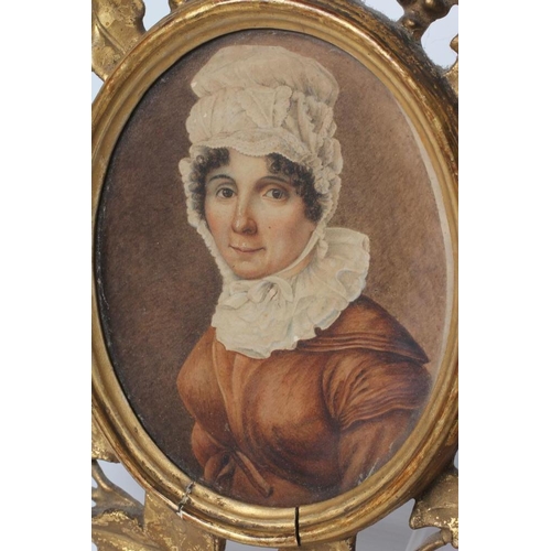 176 - ENGLISH SCHOOL (Early/Mid 19th Century), A Lady in a Brown Dress and White Bonnet, oval watercolour ... 