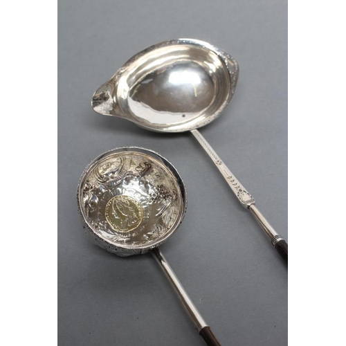 200 - A LATE GEORGE III PUNCH LADLE, possibly Charles Hougham, London 1791, the single lipped oval bowl wi... 