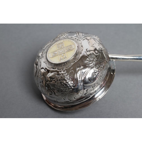 200 - A LATE GEORGE III PUNCH LADLE, possibly Charles Hougham, London 1791, the single lipped oval bowl wi... 