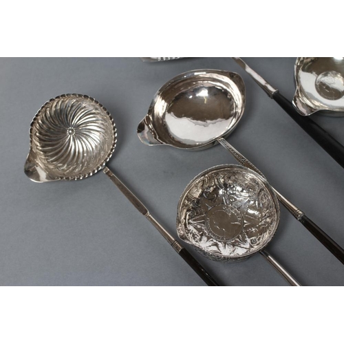 202 - A GEORGE III PUNCH LADLE, indistinct maker's mark, London 1784, the circular bowl with 1711 inset co... 