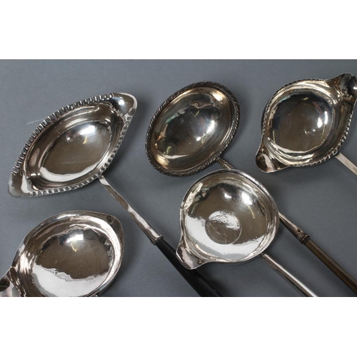 202 - A GEORGE III PUNCH LADLE, indistinct maker's mark, London 1784, the circular bowl with 1711 inset co... 