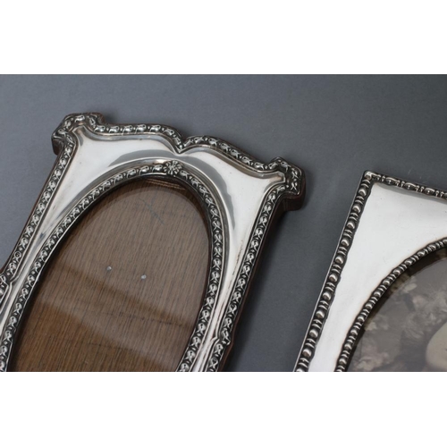 217 - A COLLECTION OF FIVE EASEL BACK PHOTOGRAPH FRAMES, comprising two oval, Chester 1919, 6 1/4