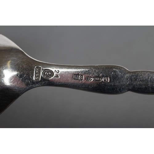 262 - A GEORG JENSEN SPOON, stamped 925 S, 21, George Stockwell import marks London 1931, in Blossom patte... 