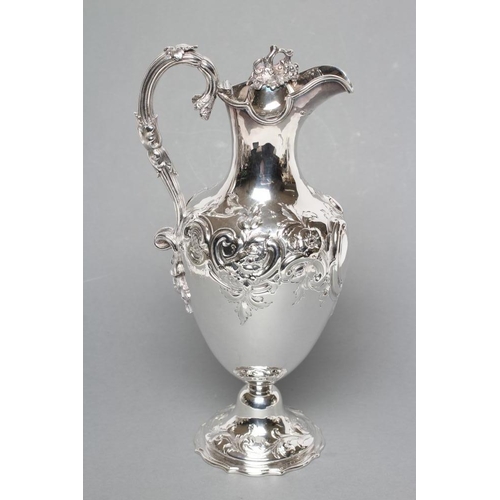 290 - A MID VICTORIAN CLARET JUG, possibly William Smiley, London 1860, of vase form, the hinged cover wit... 