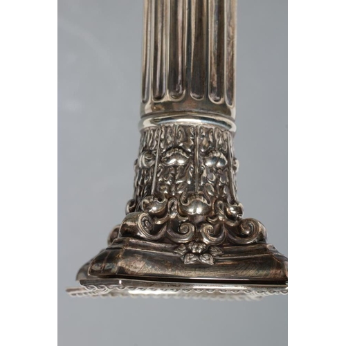 296 - A COMPOSITE PAIR OF CORINTHIAN COLUMN CANDLESTICKS, maker Ellis & Co., Birmingham 1912 and 1915, wit... 