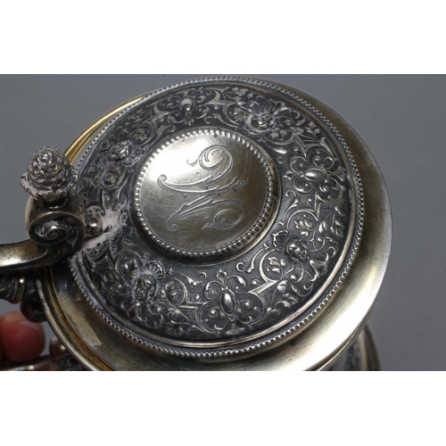 298 - A RUSSIAN TANKARD, post 1876, 84 standard, of swept cylindrical form chased with six vacant oval bos... 