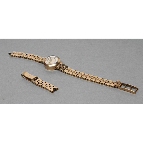 345 - A LADY'S 9CT GOLD JAEGAR LECOULTRE WRISTWATCH, the matt off white dial with applied metal batons and... 