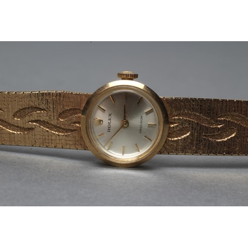 346 - A LADY'S 9CT GOLD ROLEX WRISTWATCH, the champagne dial with gilt metal batons, the eight jewel movem... 