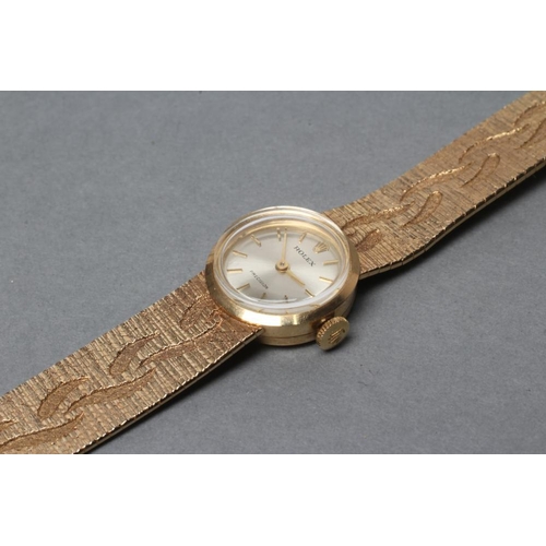 346 - A LADY'S 9CT GOLD ROLEX WRISTWATCH, the champagne dial with gilt metal batons, the eight jewel movem... 