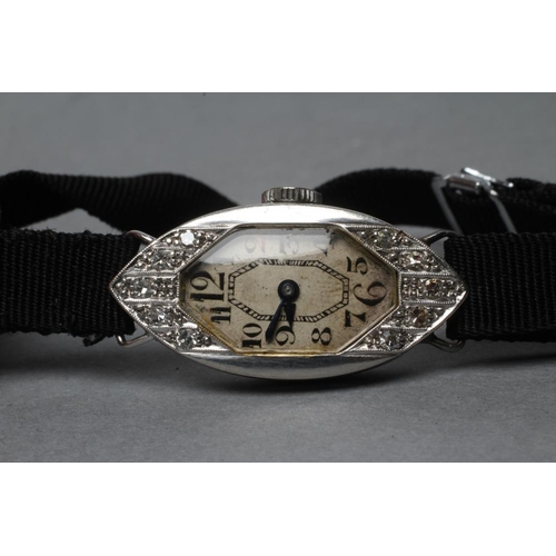 359 - A DIAMOND COCKTAIL WATCH, the shaped oblong silvered dial with black Arabic numerals, un-named fifte... 