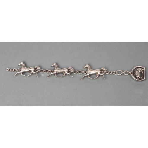 365 - A HEAVY SILVER TRIPLE HORSE BRACELET, the three dimensional cast carriage horses with plain circular... 