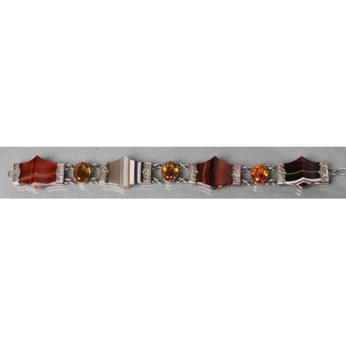 372 - A VICTORIAN SCOTTISH AGATE BRACELET, the four shaped and polished banded agates with foliate engrave... 