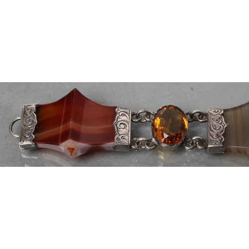 372 - A VICTORIAN SCOTTISH AGATE BRACELET, the four shaped and polished banded agates with foliate engrave... 