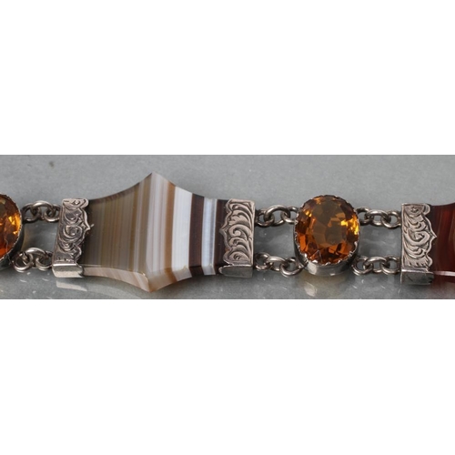 372 - A VICTORIAN SCOTTISH AGATE BRACELET, the four shaped and polished banded agates with foliate engrave... 