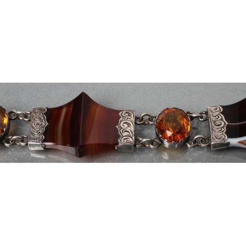 372 - A VICTORIAN SCOTTISH AGATE BRACELET, the four shaped and polished banded agates with foliate engrave... 