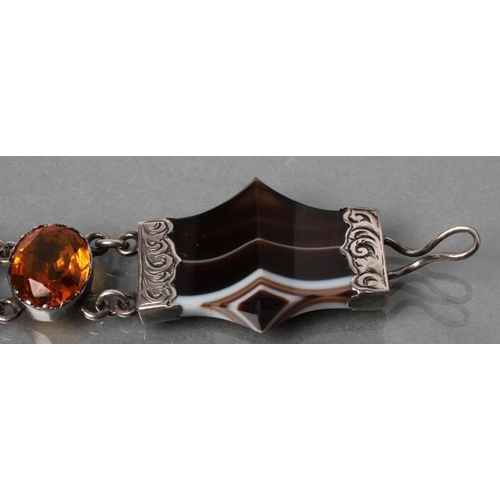 372 - A VICTORIAN SCOTTISH AGATE BRACELET, the four shaped and polished banded agates with foliate engrave... 