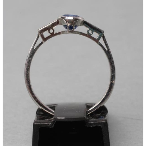 395 - A CEYLON SAPPHIRE AND DIAMOND RING, the oval facet cut sapphire of 1.26cts collet set to angular sho... 