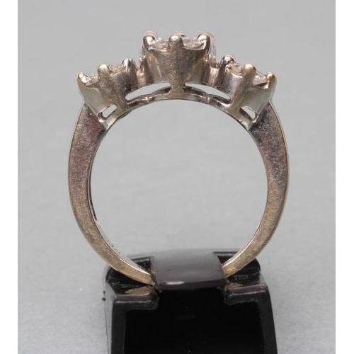 408 - A DIAMOND TRIPLE CLUSTER RING, the central seven stone cluster point set and flanked by a pair of si... 