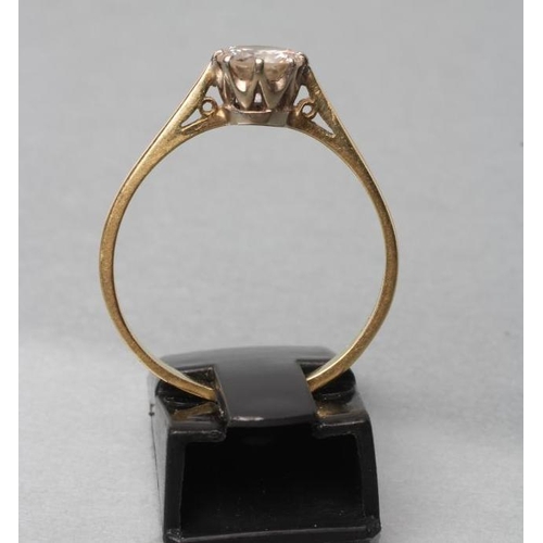 409 - A SOLITAIRE DIAMOND RING, the old brilliant cut stone of approximately 0.80cts, claw set to a plain ... 