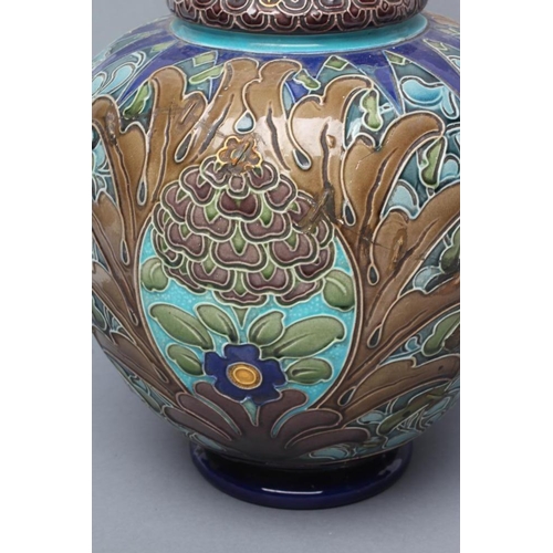 41 - A BURMANTOFTS FAIENCE VASE, early 20th century, of baluster form with tall flared neck, tubelined an... 