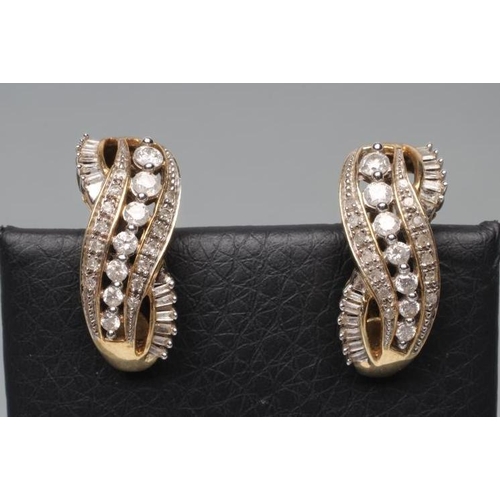 417 - A PAIR OF DIAMOND EARRINGS, the open double 