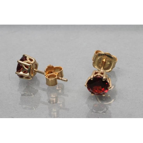 430 - A PAIR OF GARNET EAR STUDS, stamped 375 (Est. plus 21% premium inc. VAT)