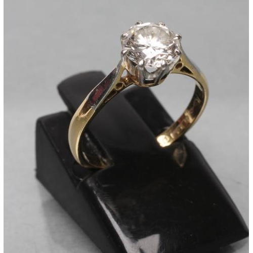 431 - A SOLITAIRE DIAMOND RING, the brilliant cut stone of approximately 0.7cts, claw set to a plain shank... 