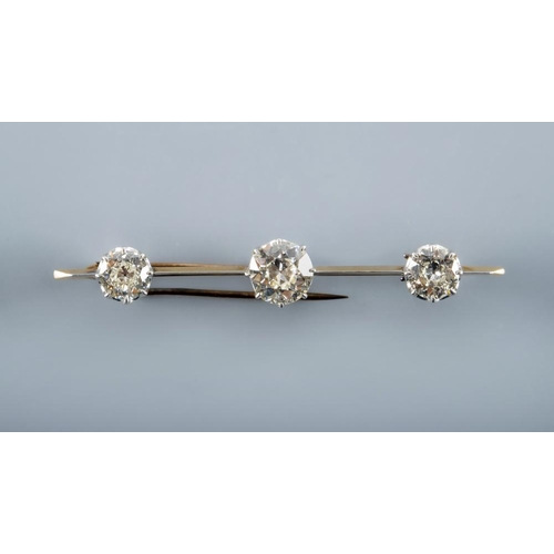 432 - A DIAMOND BAR BROOCH, the unmarked knife edge bar centred by an old cut stone of approximately 1.75c... 