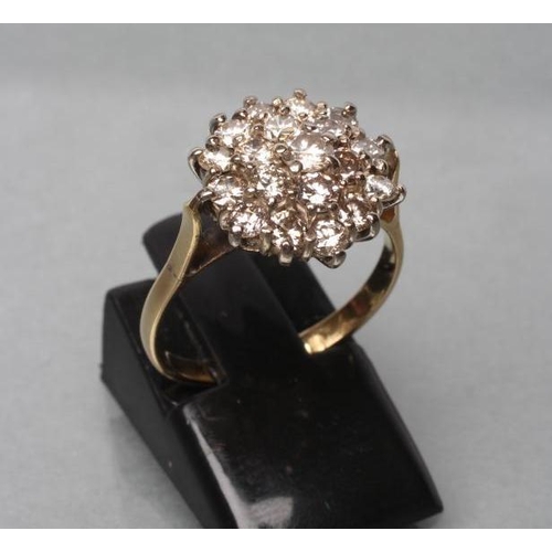 458 - A DIAMOND CLUSTER RING, the nineteen brilliant cut stones claw set to a plain 18ct gold shank, Londo... 