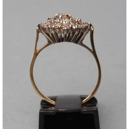 458 - A DIAMOND CLUSTER RING, the nineteen brilliant cut stones claw set to a plain 18ct gold shank, Londo... 