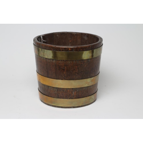 495 - AN OAK AND BRASS BANDED JARDINIERE, 20th century, of circular coopered construction with tapering si... 