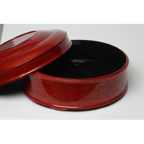 512 - A LARGE VIETNAMESE RED LACQUER BETEL BOX AND COVER, modern, of plain cylindrical form with lift-off ... 