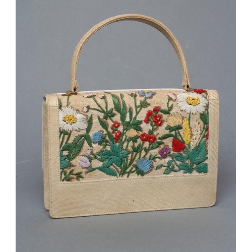 514 - A GUCCI HANDBAG, c.1970, made under licence, in tightly woven cream cane, short handle, the flap and... 