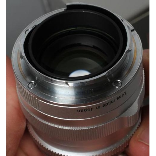 545 - A CARL ZEISS PLANAR LENS, 2/50 ZM, T*, 15868368, boxed, together with an Ernst Leitz GmbH Wetzlar le... 